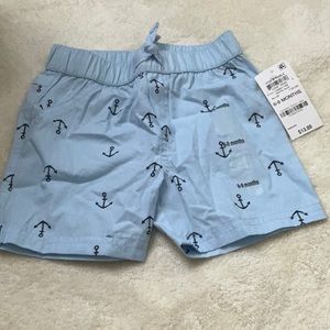 First Impressions NWT pull-up shorts. Light blue with navy anchors. 6-9m